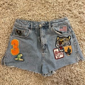 Topshop distressed jean shorts with decorative patches